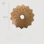Miroir doré à rayons pour un intérieur lumineux