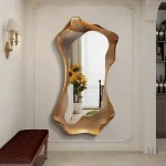 Miroir mural doré sculpté Vesuvio avec éclairage LED