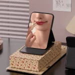 Miroir de poche avec design pliable et support pratique