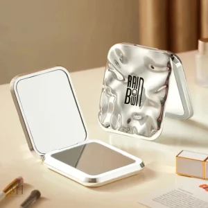 Miroir portable avec grossissement x2 pratique
