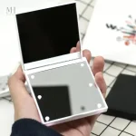 Miroir compact avec grossissement et éclairage LED intégré