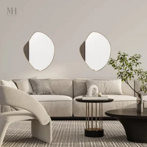Miroir doré irrégulier au design organique