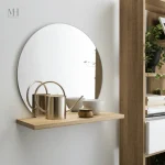 Miroir mural rond avec étagère en bois, design fonctionnel