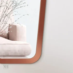 Miroir mural élégant en cuivre, idéal pour décoration intérieure