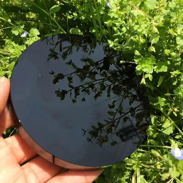 Élégant miroir noir en obsidienne, accent décoratif chic