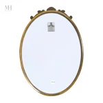 Miroir ovale avec finition dorée brillante