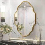 Grand miroir à contours dorés, style lanterne asymétrique