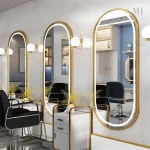 Miroir LED ovale doré pour un éclairage moderne