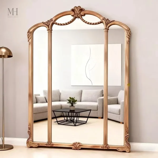 Grand miroir mural doré avec design en triple arche
