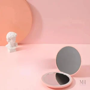 Miroir de maquillage compact avec fonction grossissante