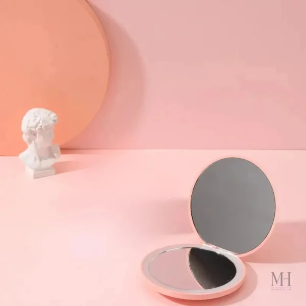 Miroir de maquillage compact avec fonction grossissante