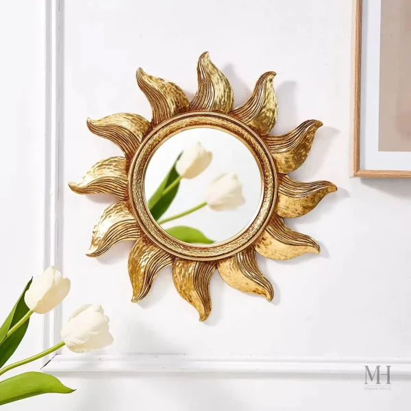 Miroir mural rond doré au design contemporain